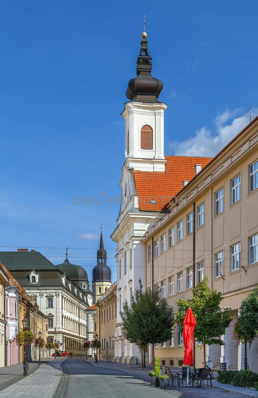 Street with historical houses in Trnava downtown, Slovakia