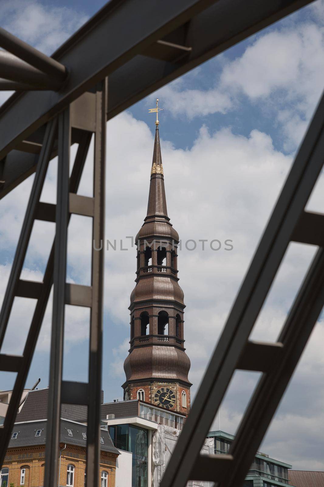 Historic St. Catherine's Church (Katharinenkirche), one of the five principal Lutheran churches (Hamburger Hauptkirchen) with old bridge in Hamburg, Germany.