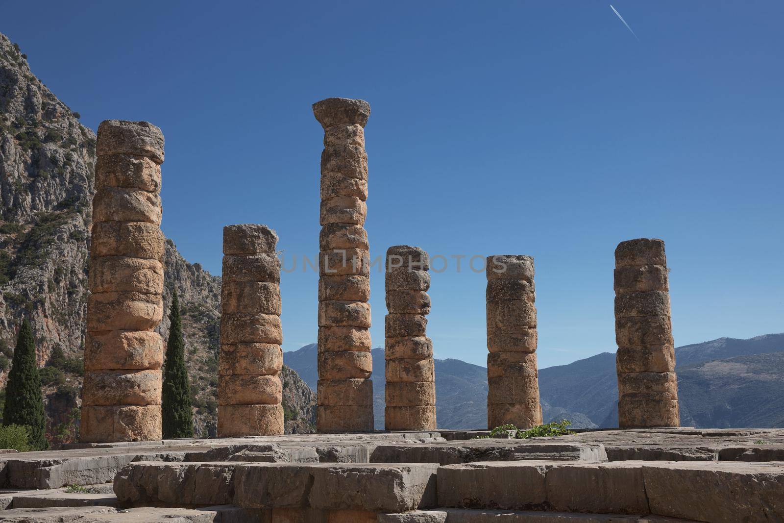 Apollo Temple in Delphi, an archaeological site in Greece, at the Mount Parnassus. Delphi is famous by the oracle at the sanctuary dedicated to Apollo. UNESCO World heritage.