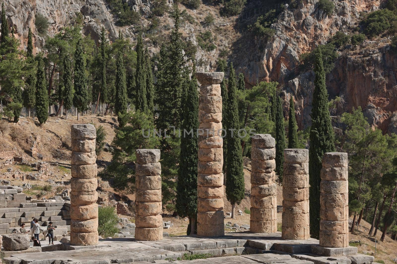 Apollo Temple in Delphi, an archaeological site in Greece, at the Mount Parnassus. Delphi is famous by the oracle at the sanctuary dedicated to Apollo. UNESCO World heritage.