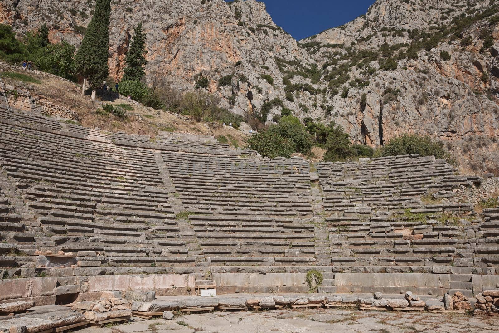 Panoramic view of Ancient Theater of Delphi, Phocis in Greece. The theater, with a total capacity of 5,000 spectators, is located at the sanctuary of Apollo. UNESCO World heritage.