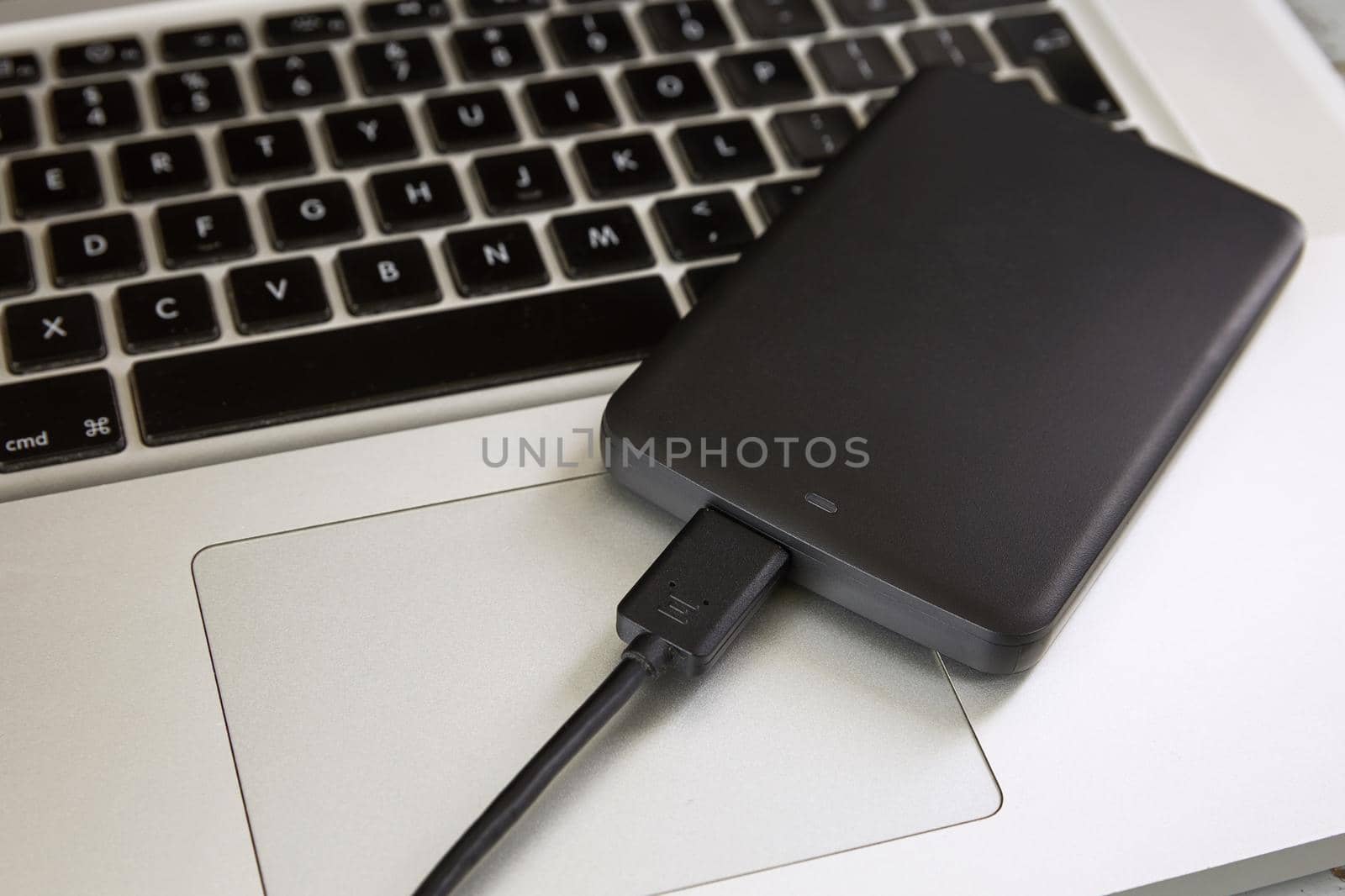 External Hard Disk Over Laptop Keyboard.