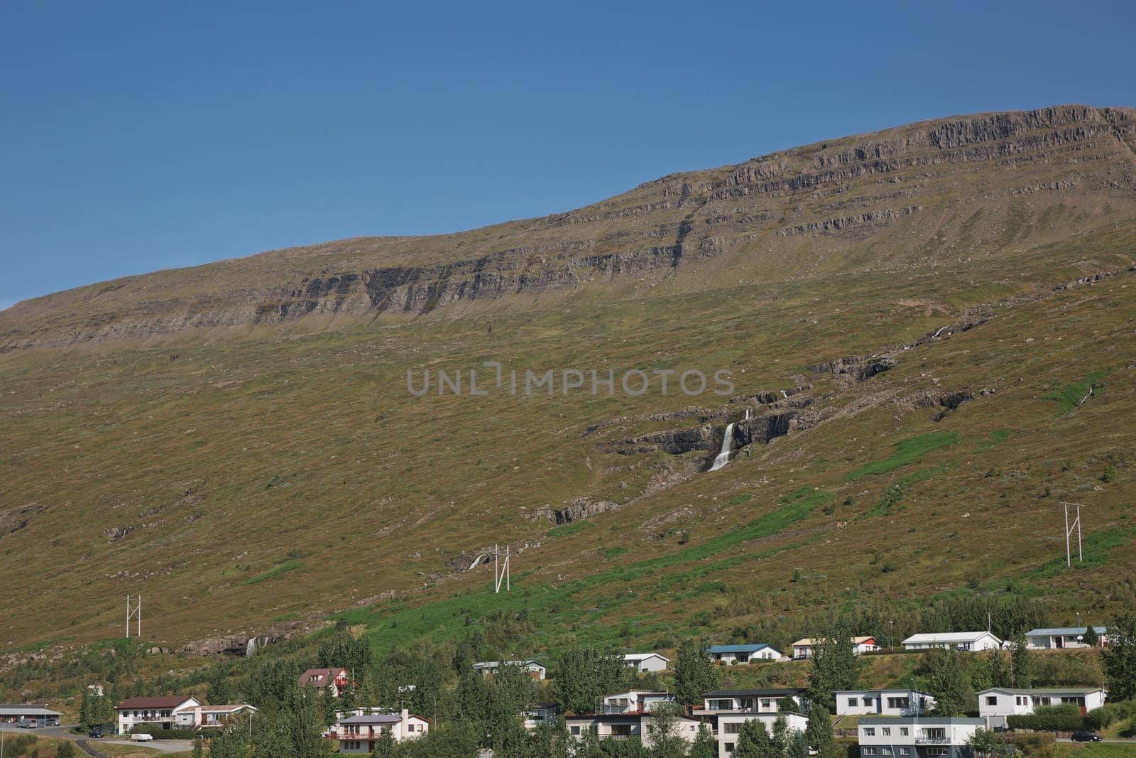 Small town of Eskifjodur located in east Iceland is surrounded by beautiful landscapes.