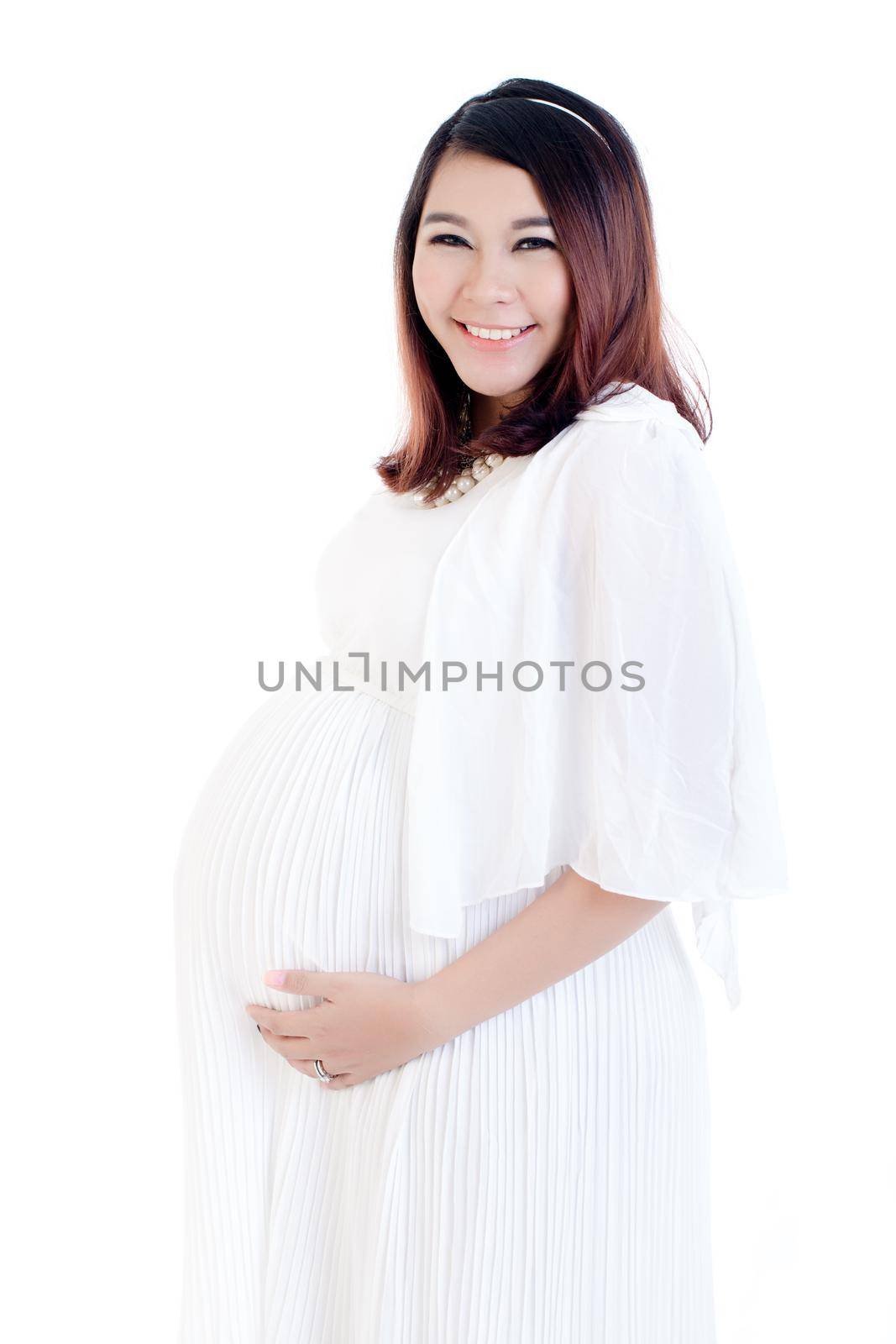 Portrait of smiling pregnant young woman isolated on white background