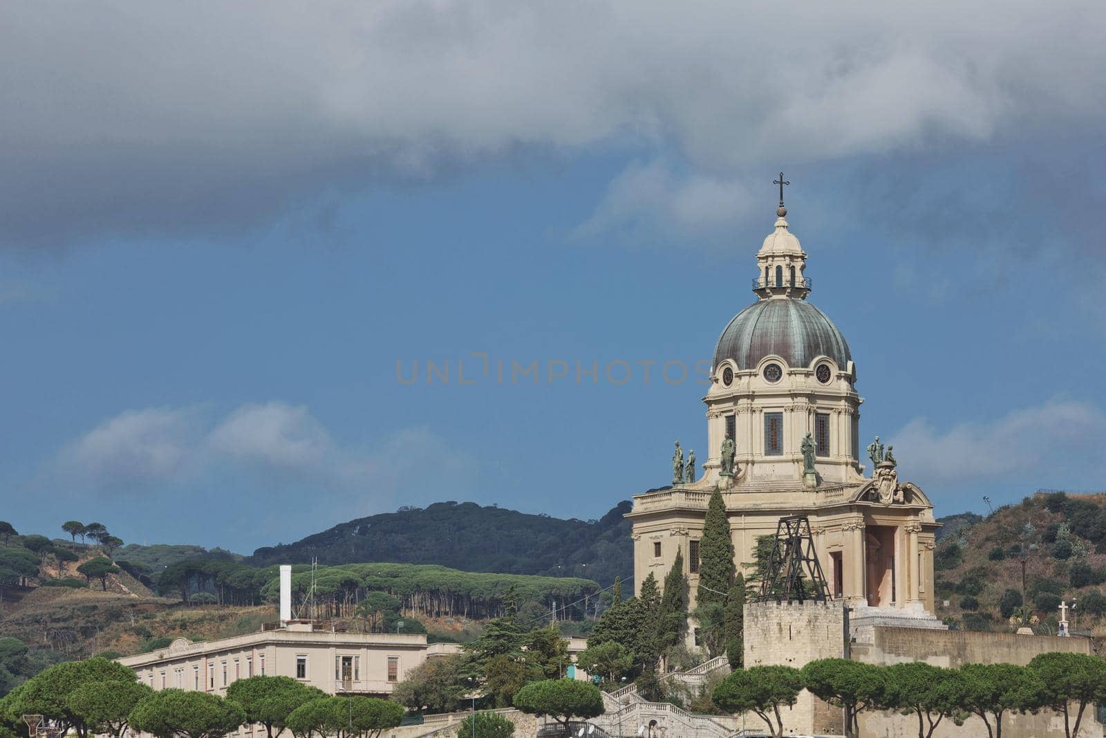 The dome of Church of King (Cristo Re) overlooking the city of Messina in Italy during summer. Beautiful photo of the landmark in Sicily.
