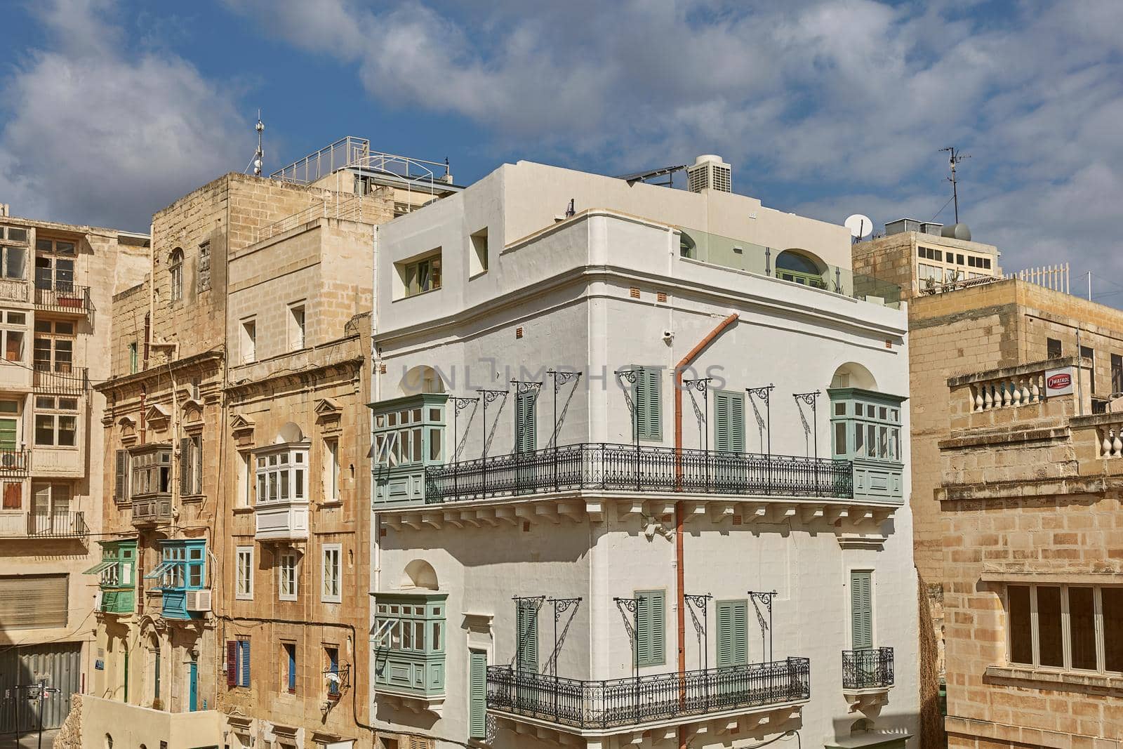 Traditional colorful and modern architecture and houses in Valletta in Malta.
