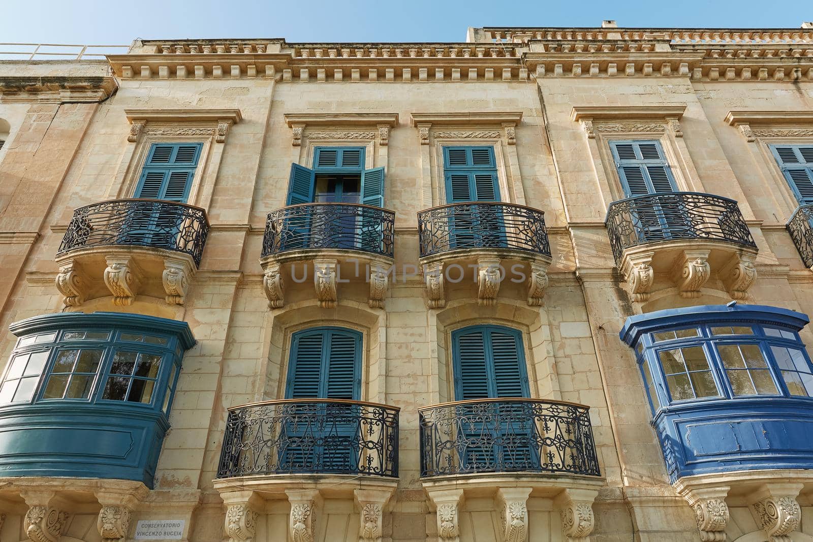 Typical and traditional colorful architecture and houses in Valletta in Malta.