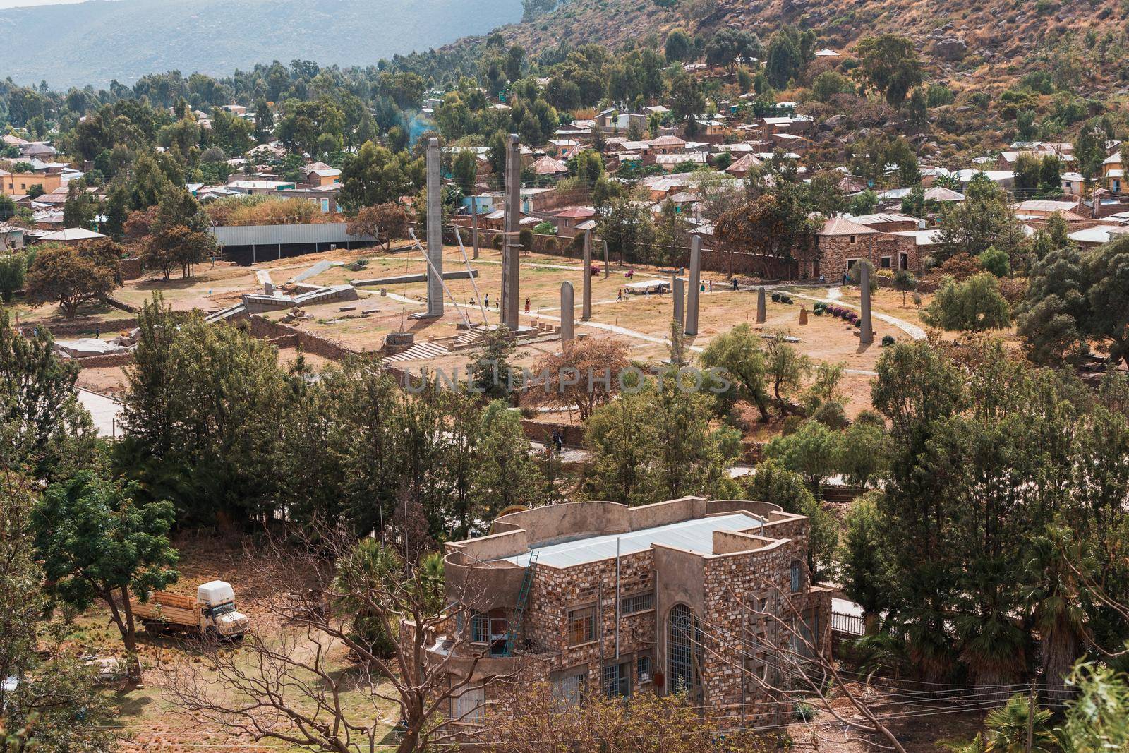 Aksumite civilization ruins, Ancient monolith stone obelisks behind Church of Our Lady of Zion, symbol of the Aksum, Ethiopia. UNESCO World Heritage site.