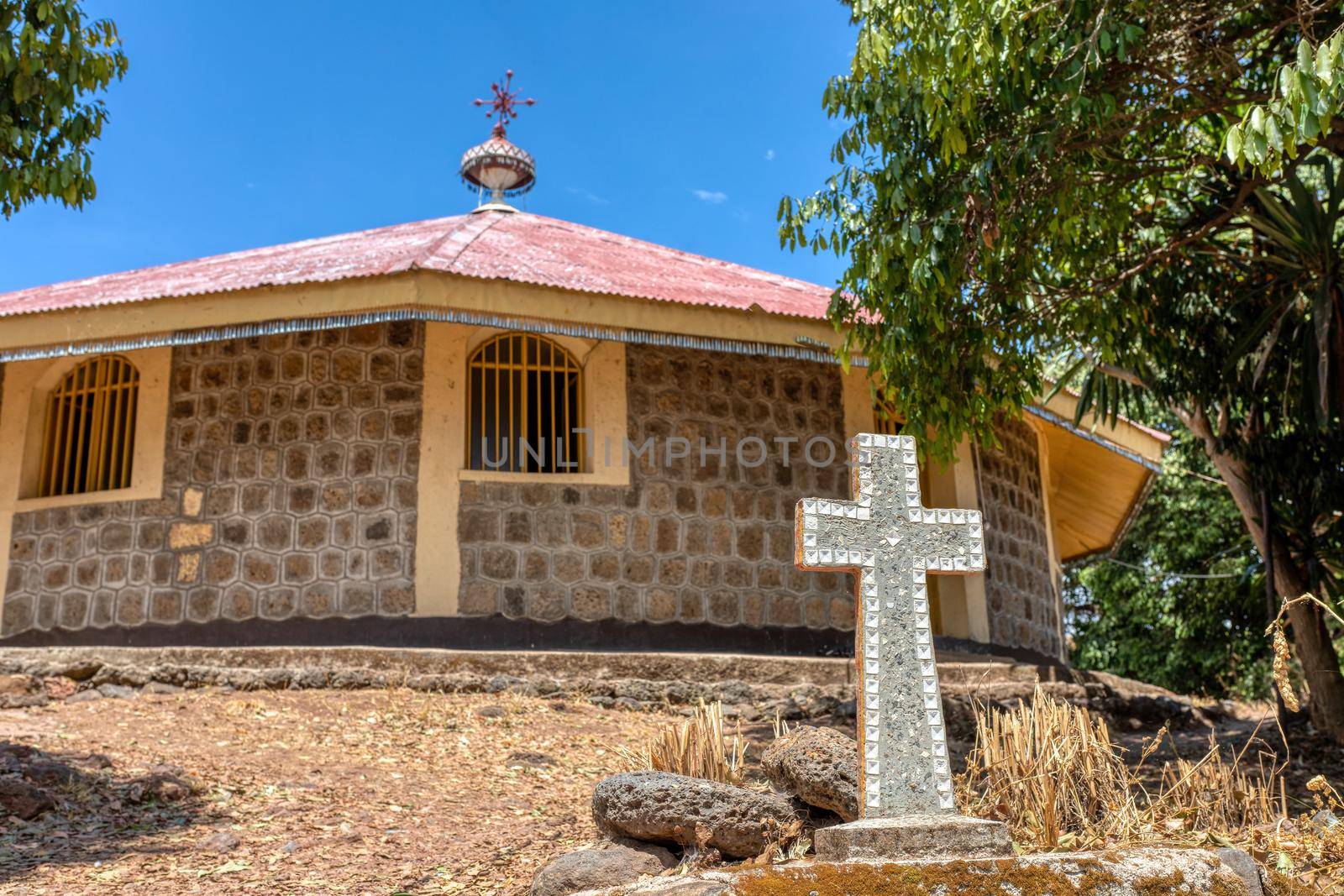 religious christian cross behind Entos Eyesu UNESCO Monastery situated on small island on lake Tana near Bahir Dar. Ethiopia Africa