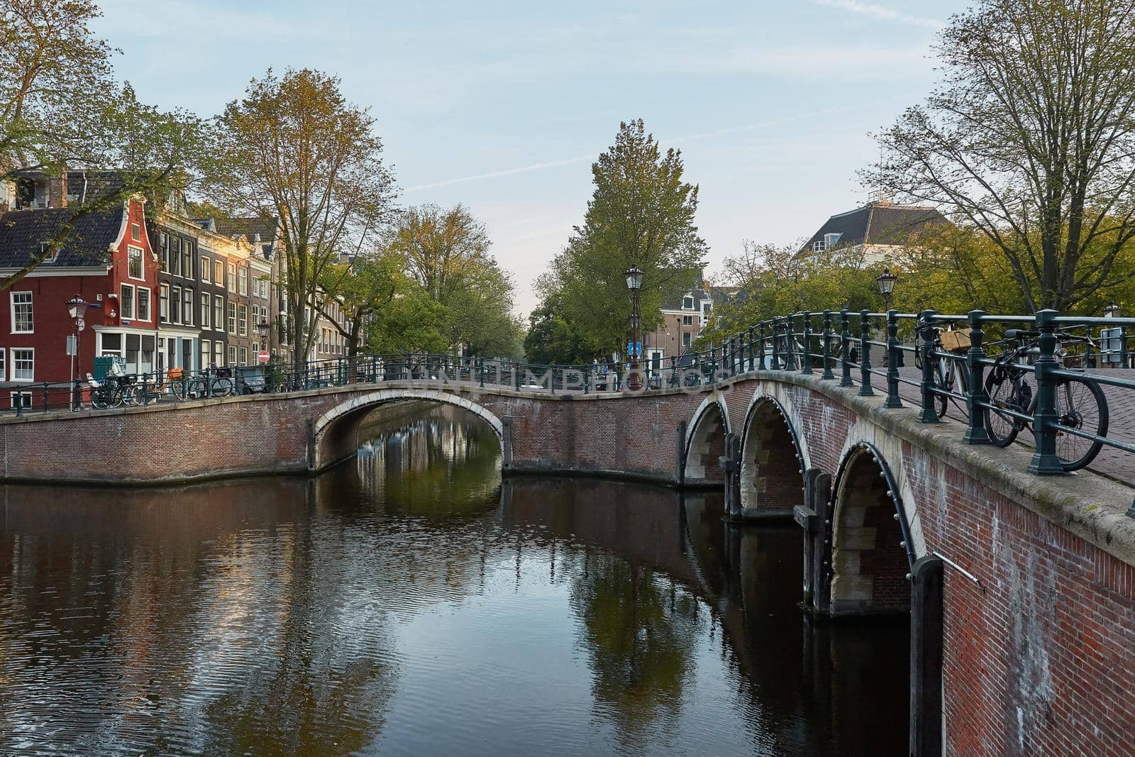 One of the many bridges over a canal in Amsterdam Netherlands.