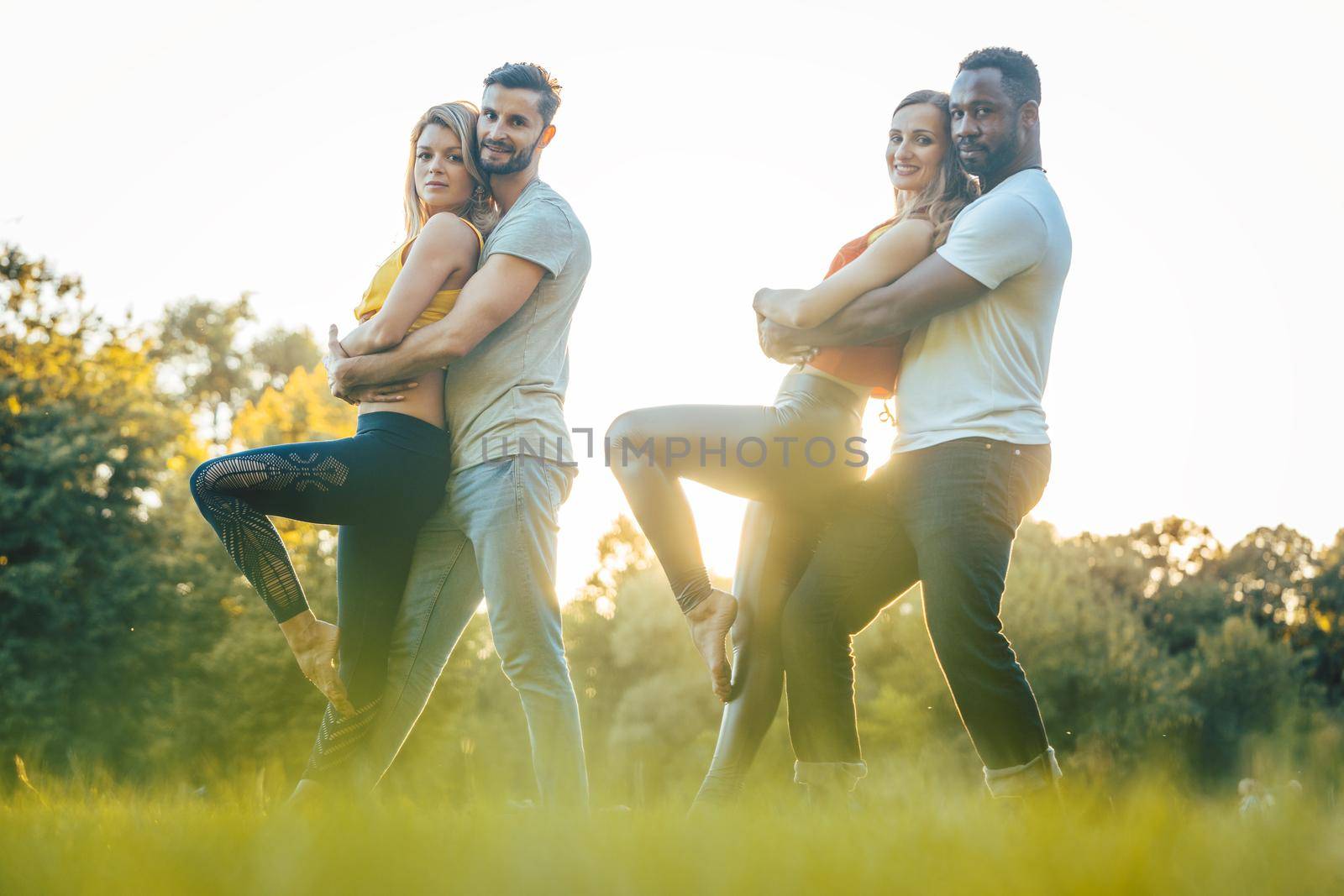 Professional dancers training outdoors in the park