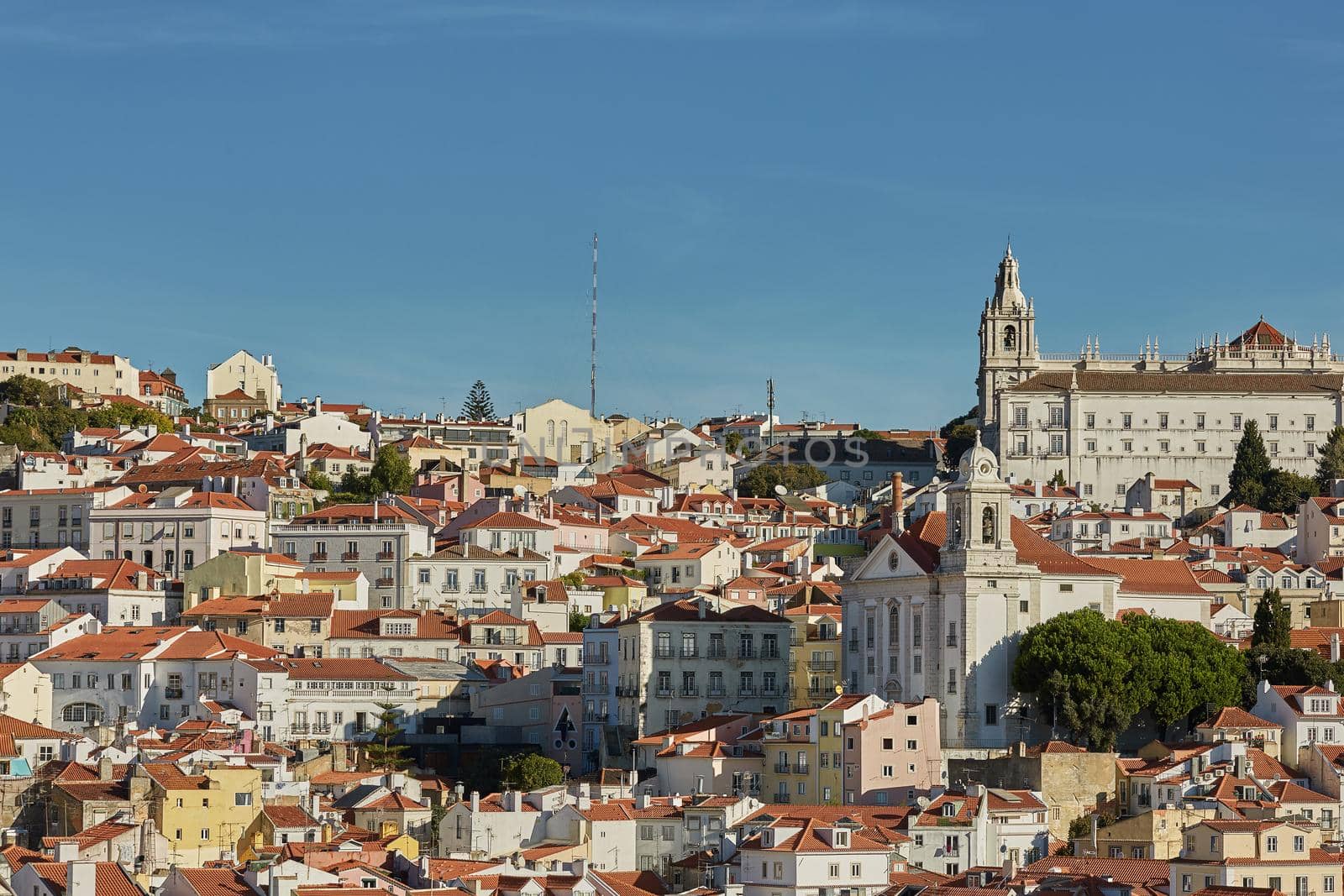 View of traditional architecture and houses on Sao Jorge hill in Lisbon, Portugal. by wondry