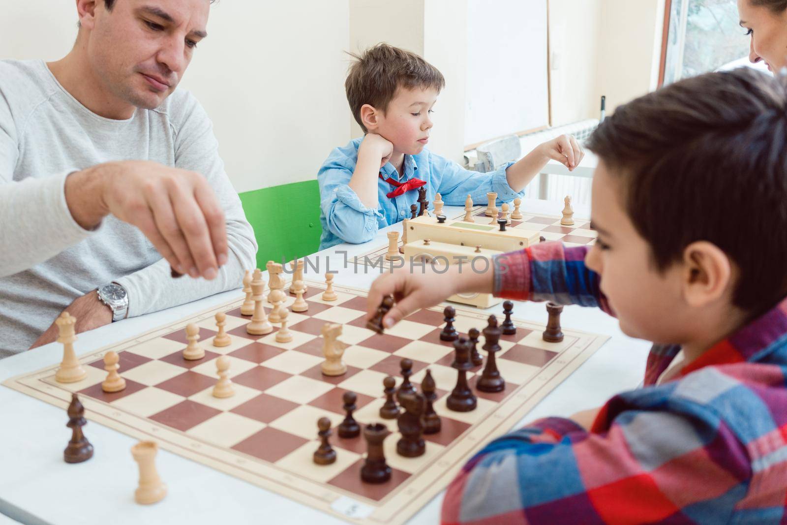 People in chess school by Kzenon