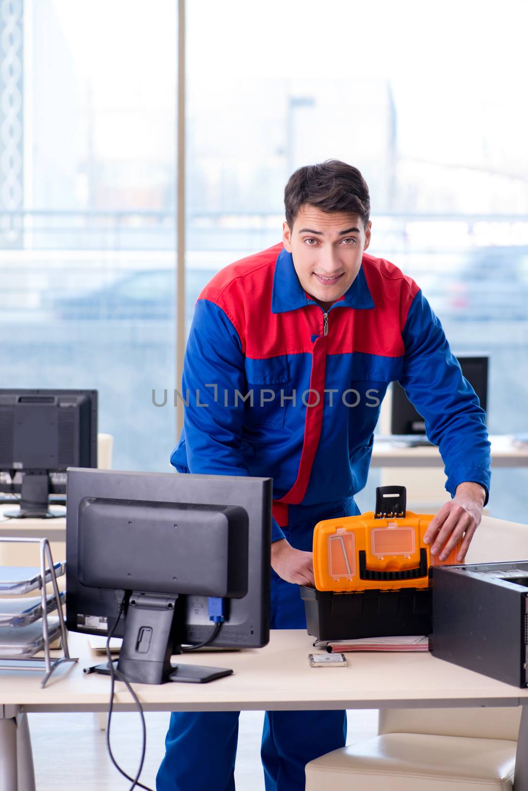 Computer repairman specialist repairing computer desktop