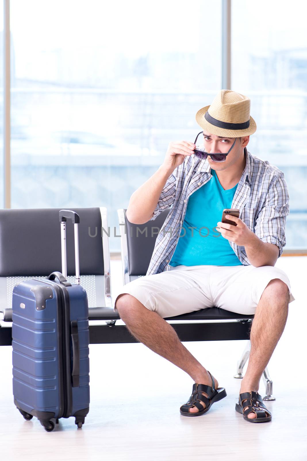 Young man travelling for his summer beach vacation