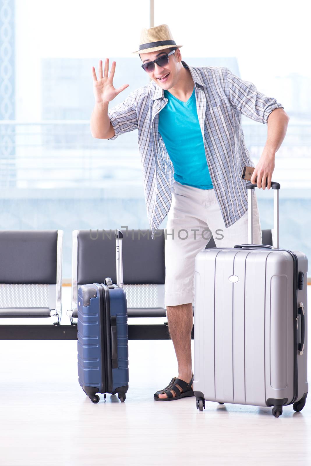 Young man travelling for his summer beach vacation