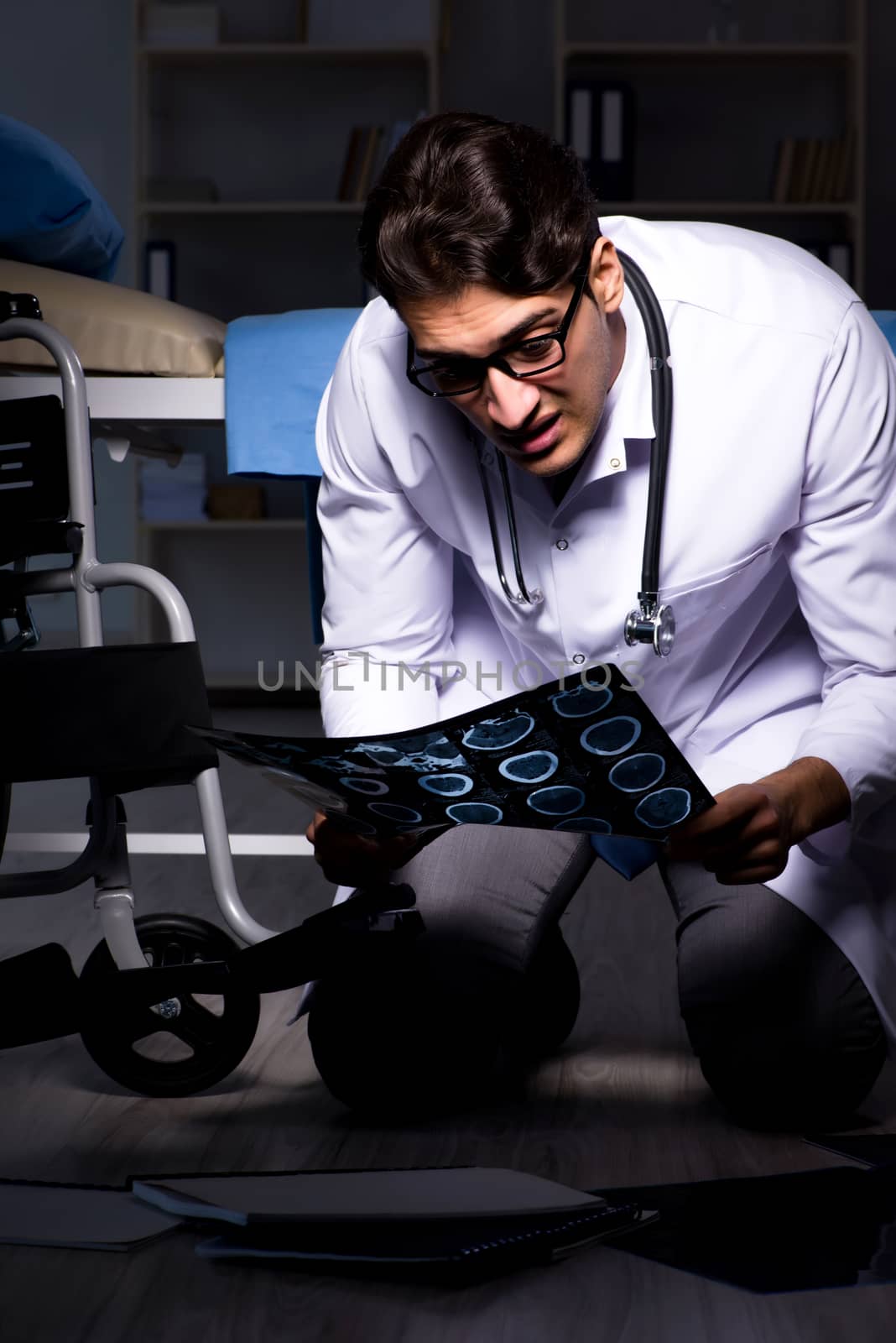 Doctor working night shift in hospital after long hours
