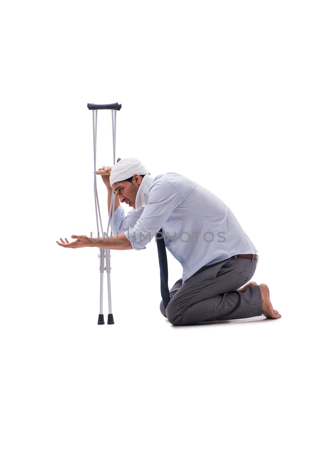 Injured businessman isolated on white background