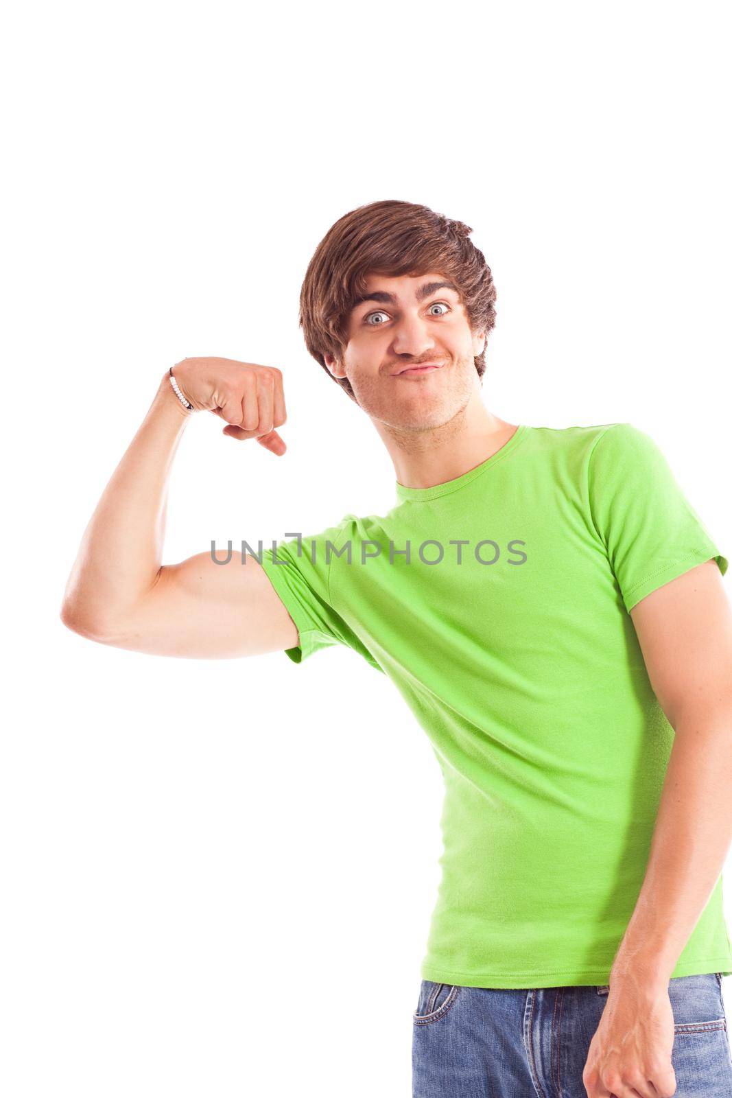 young man makes a funny grimace while showing his biceps