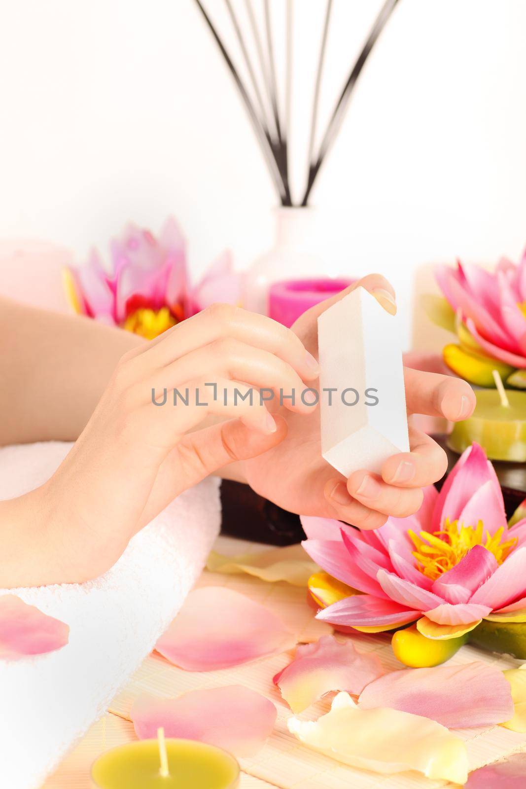 Woman doing manicure by Kzenon