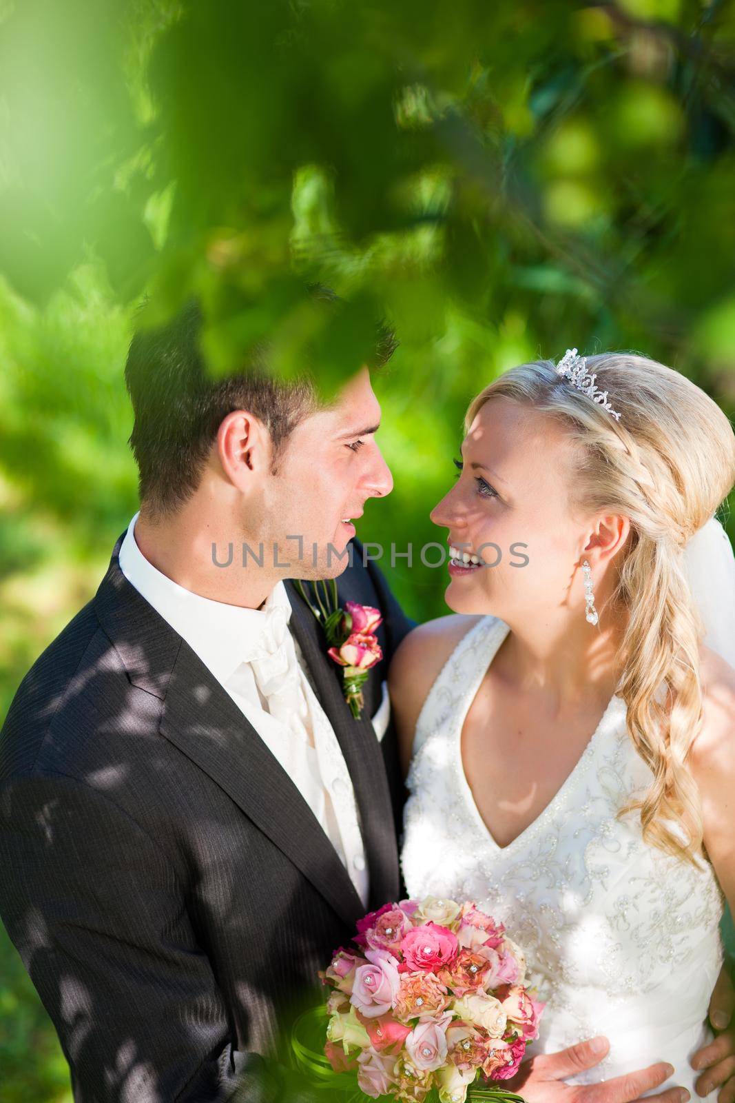 Wedding couple embracing each other moment of joy