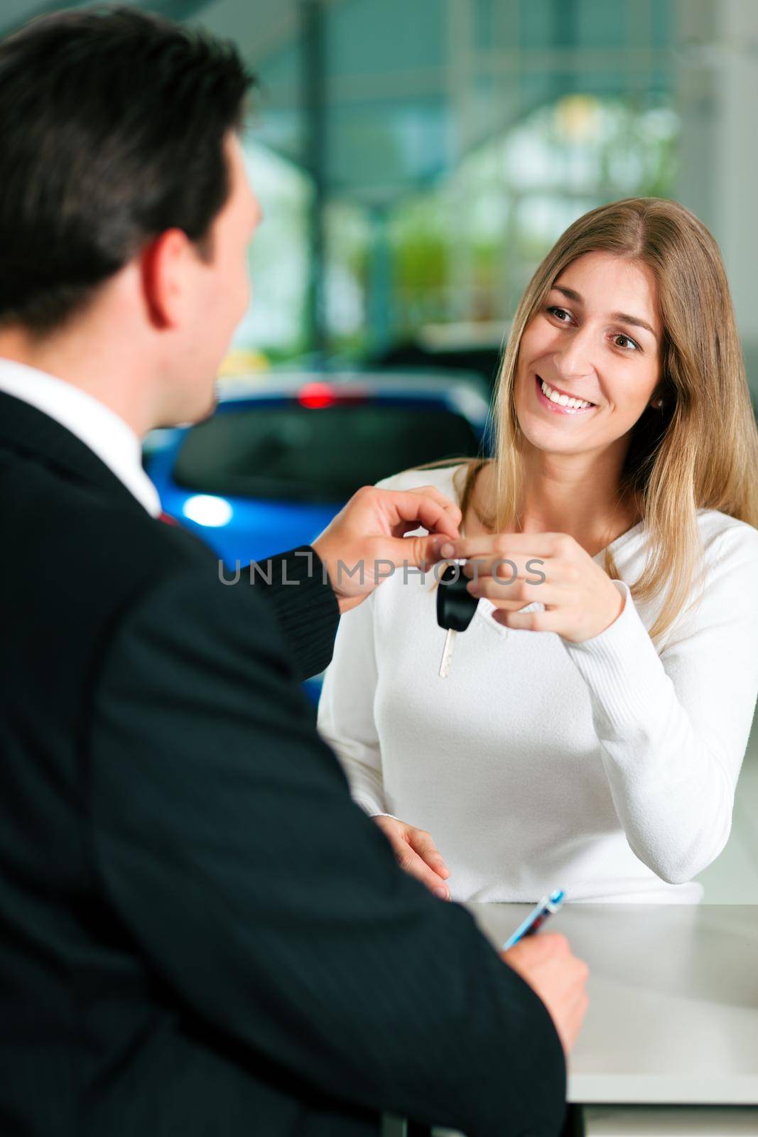 Woman buying car - key being given by Kzenon