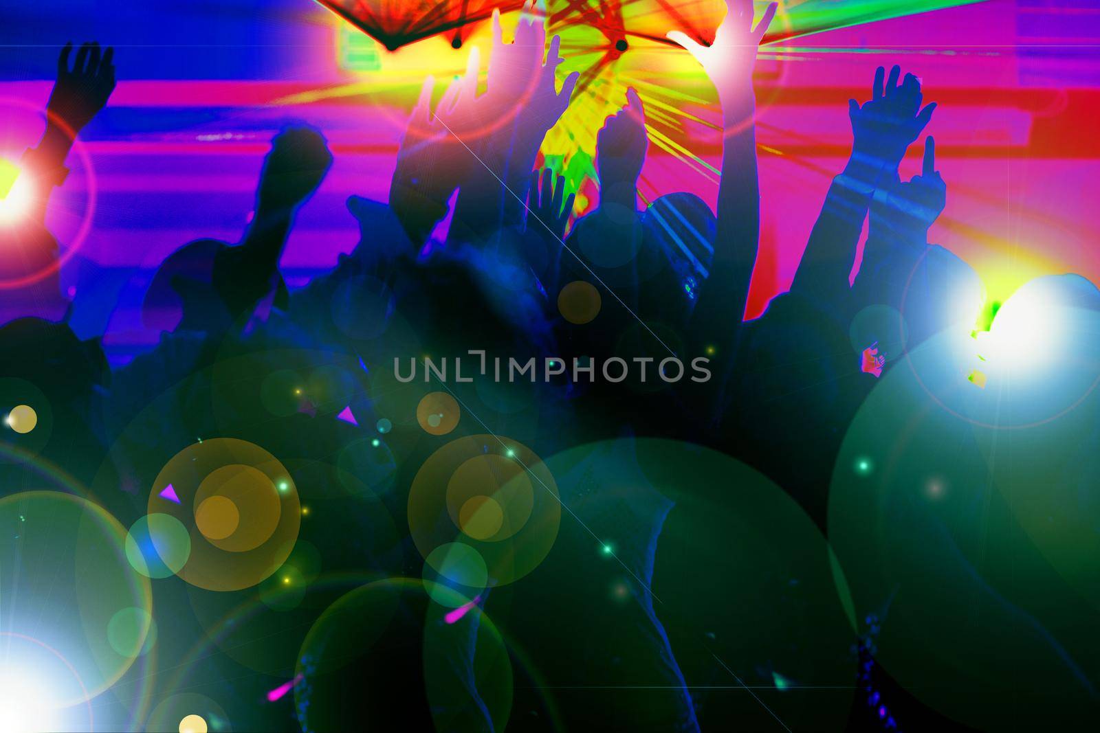 Silhouettes of dancing people having a celebration in a disco club, the light show is sending laser beams through the backlit scene; very psychedelic forms and colors