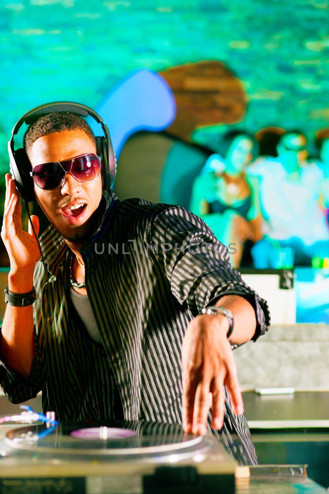 DJ in disco club, crowd background by Kzenon