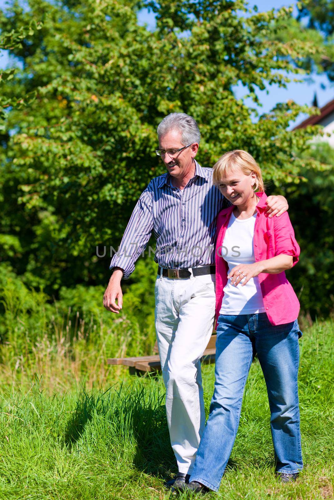 Senior couple having walk by Kzenon