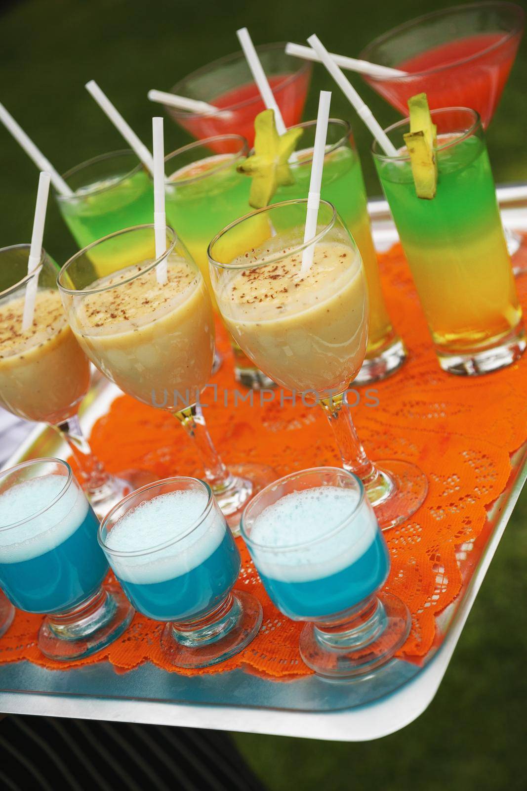 Alcohol coctail set on waiter tray