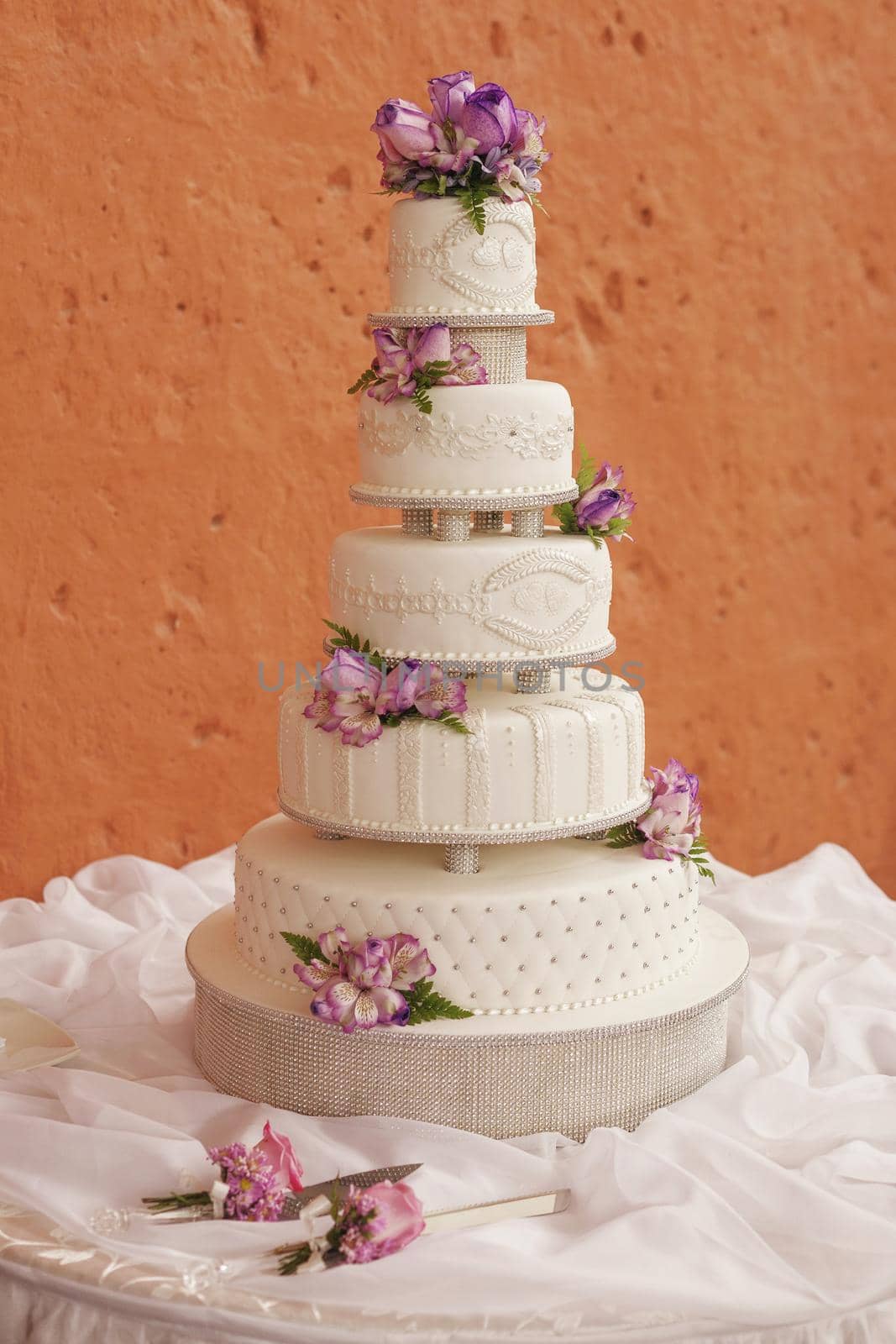 White wedding cake decorated with flowers