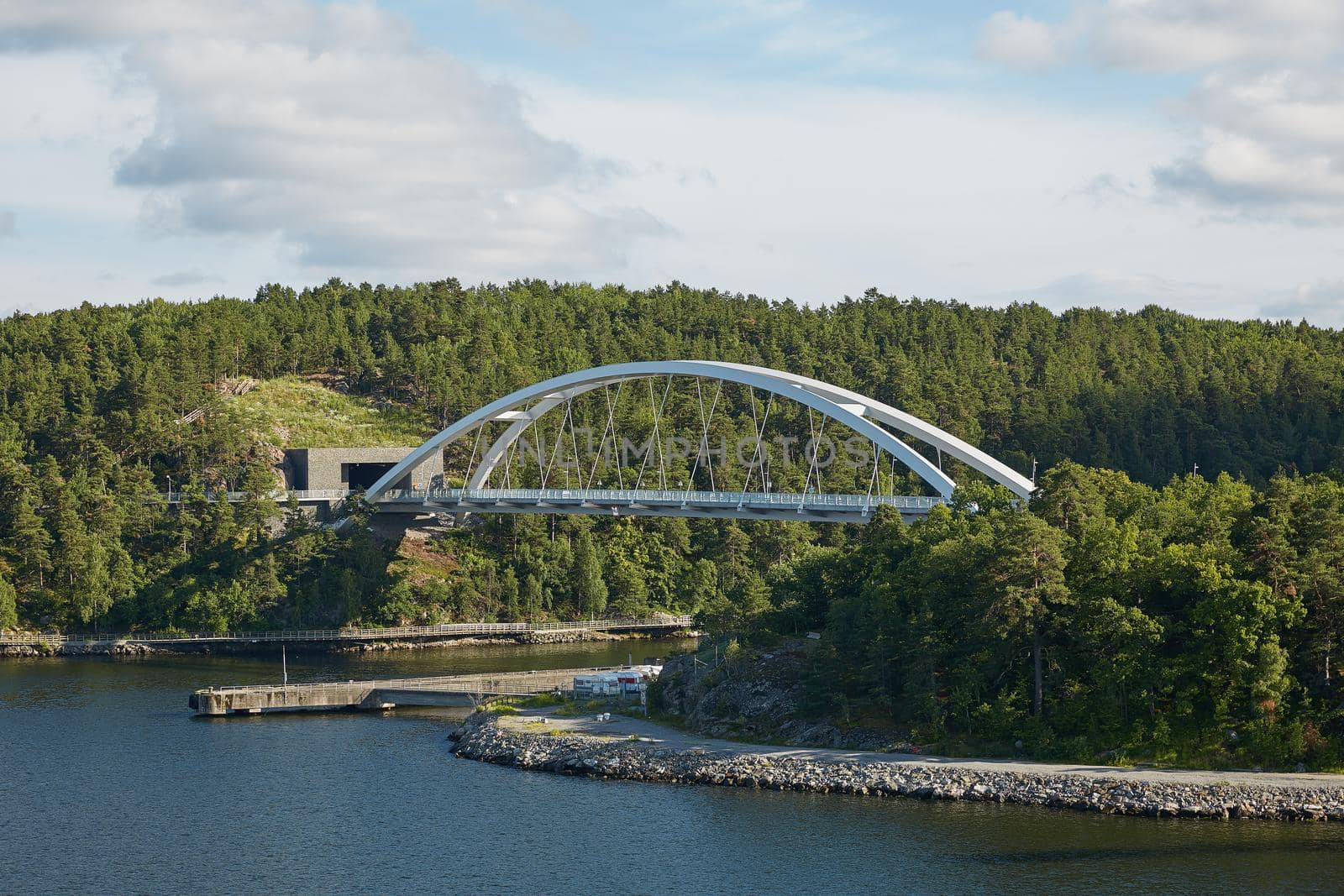 Bright day  and bridge in the Stockholm archipelago by wondry