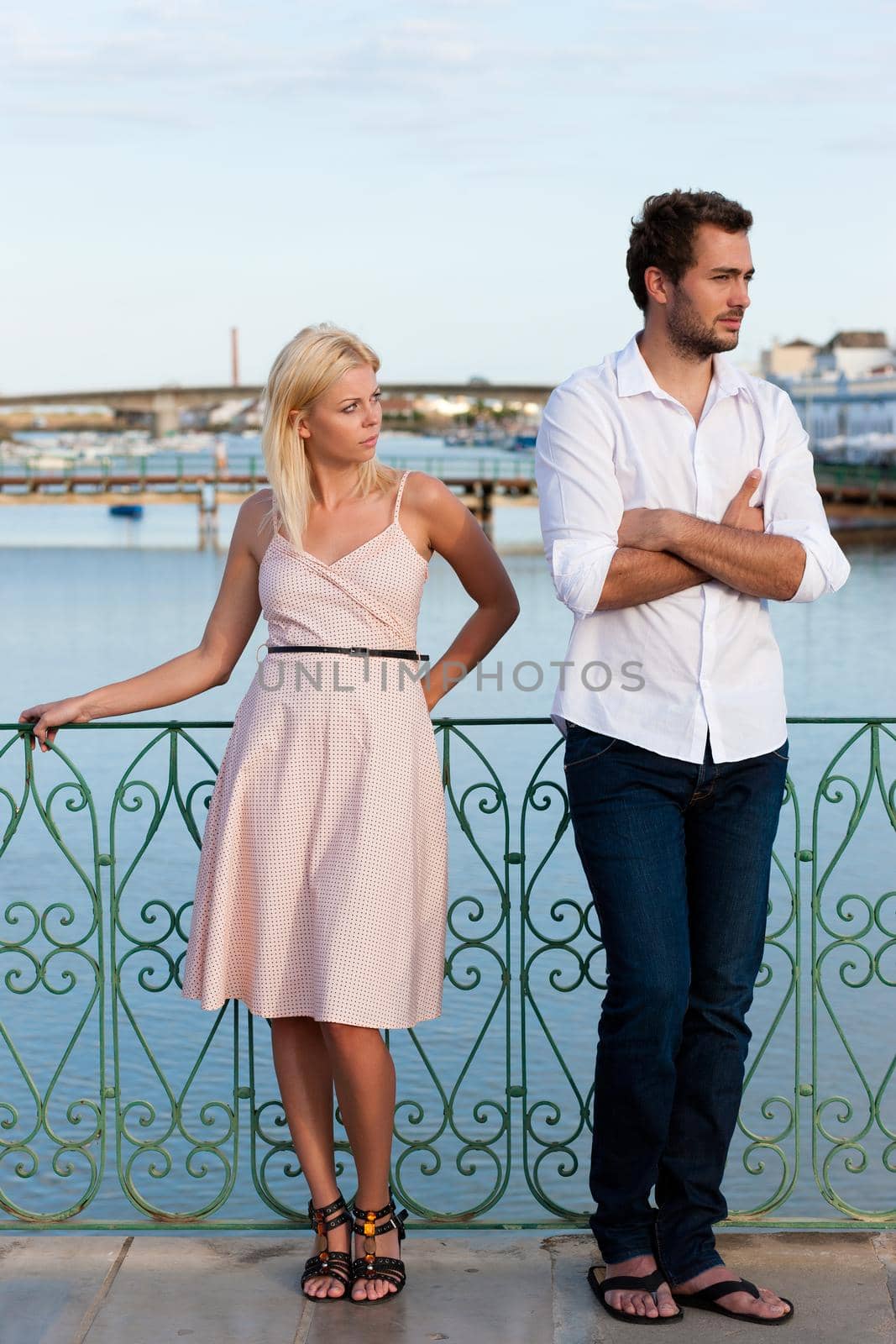 Couple having a discussion in summer in their vacation