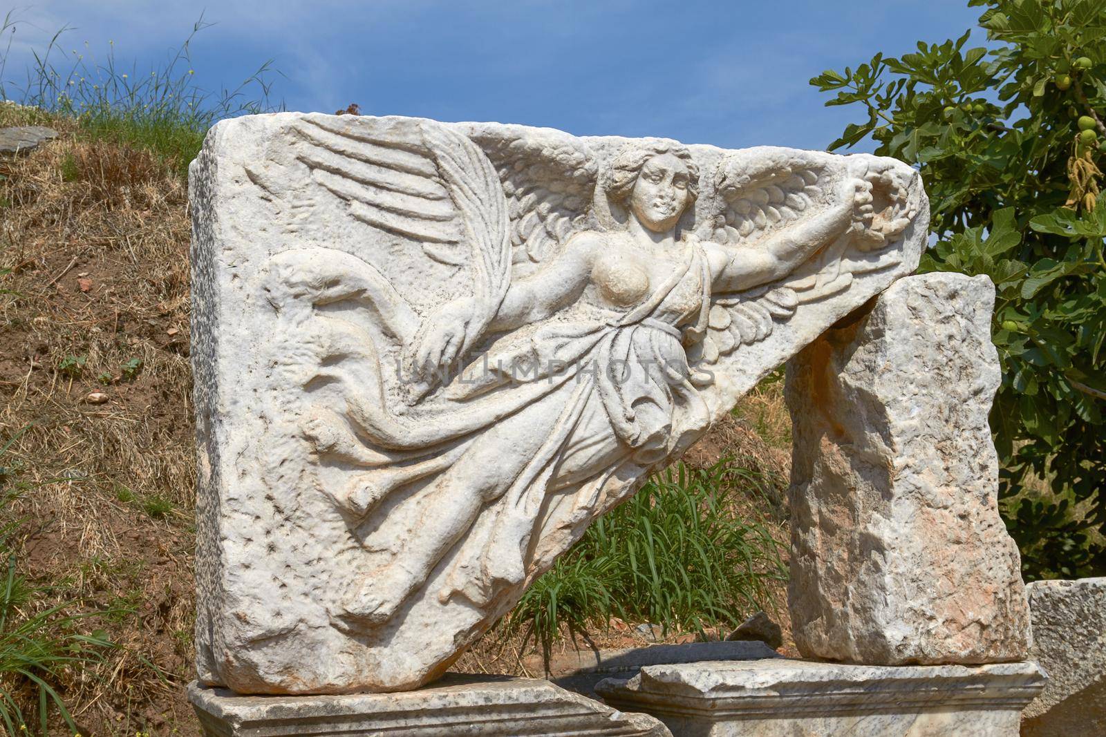 Stone Carving of the Goddess Nike in Ancient Ephesus Turkey. She is the Goddess of Victory in Greek Mythology.