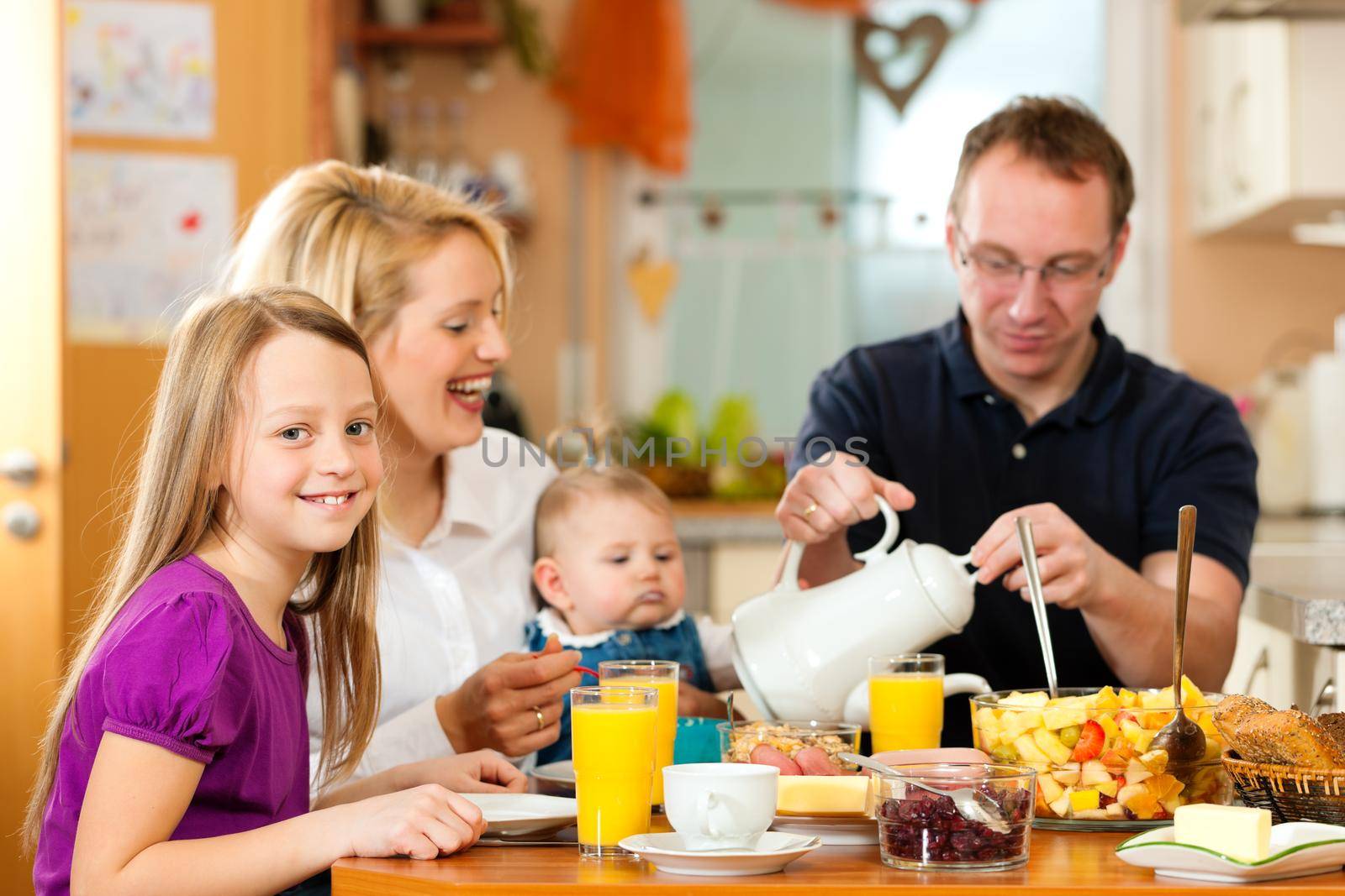 Family having breakfast by Kzenon