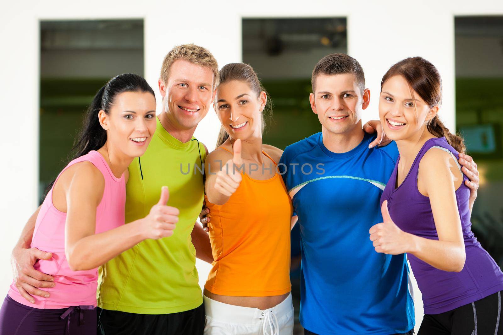 Group of people in gym by Kzenon