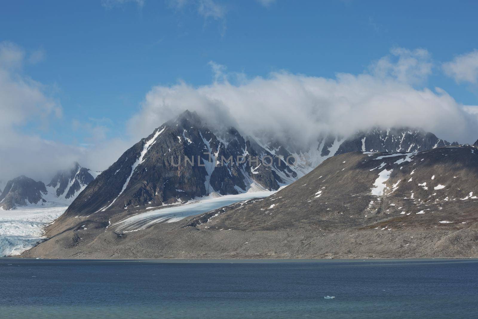 The coastline and mountains of Liefdefjord in the Svalbard Islands (Spitzbergen) in the high Arctic.