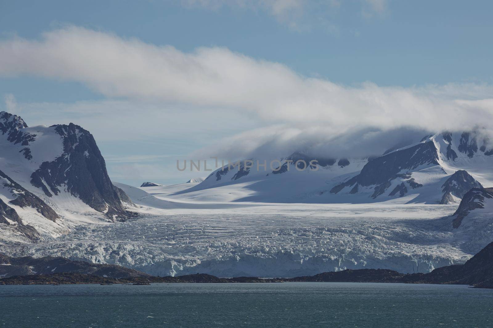 The coastline and mountains of Liefdefjord in the Svalbard Islands (Spitzbergen) in the high Arctic.