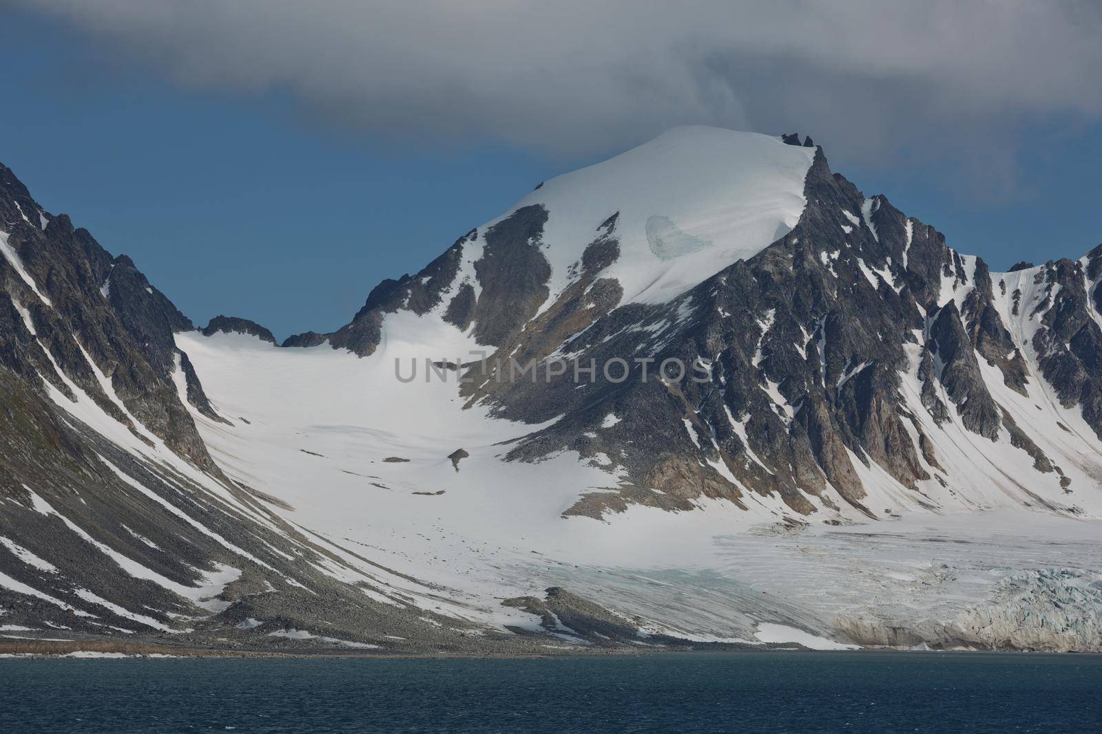 The coastline and mountains of Liefdefjord in the Svalbard Islands (Spitzbergen) in the high Arctic.