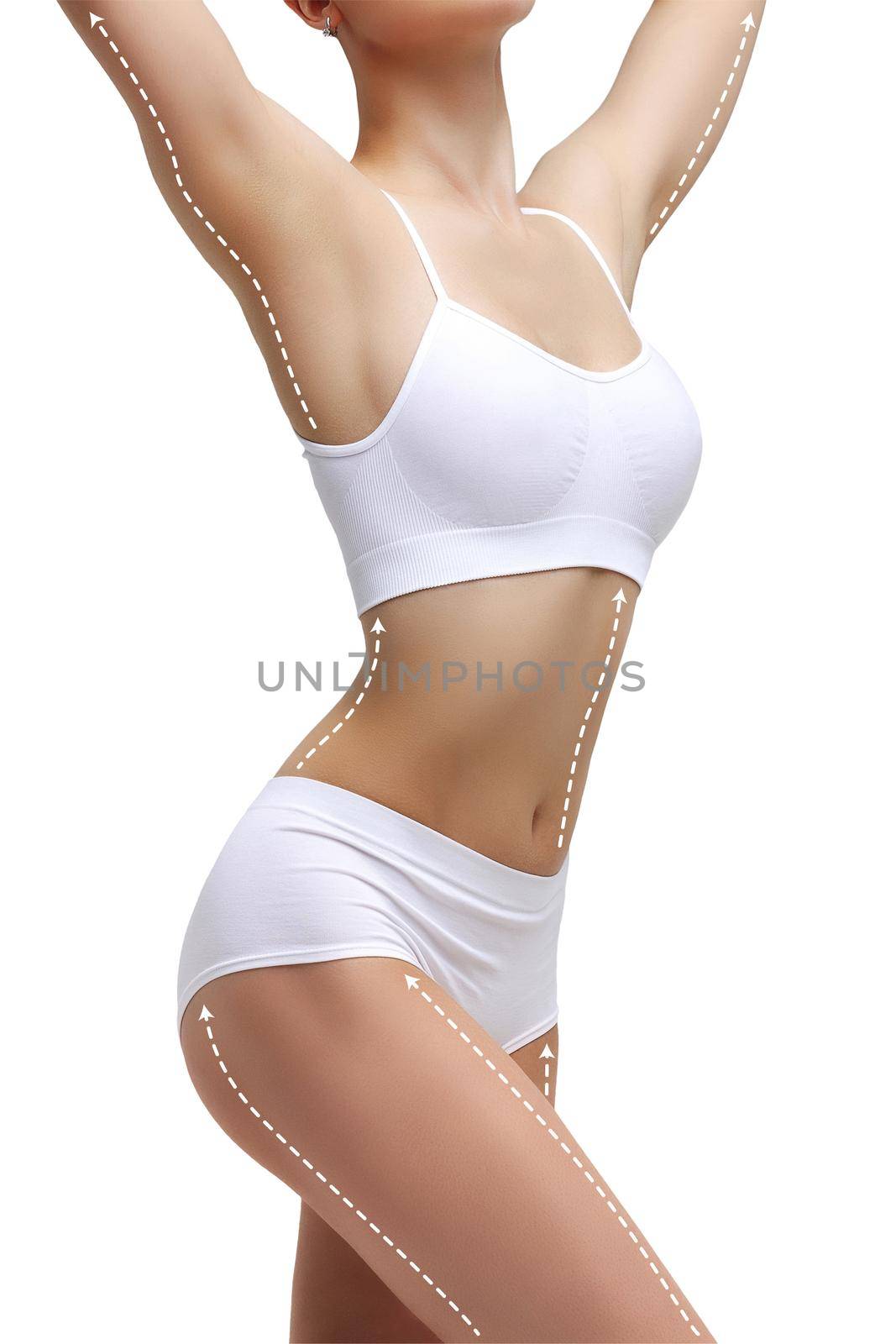 Dotted lines on beautiful female body. Closeup of woman slim fit body with white marks, isolated on white background by Nobilior