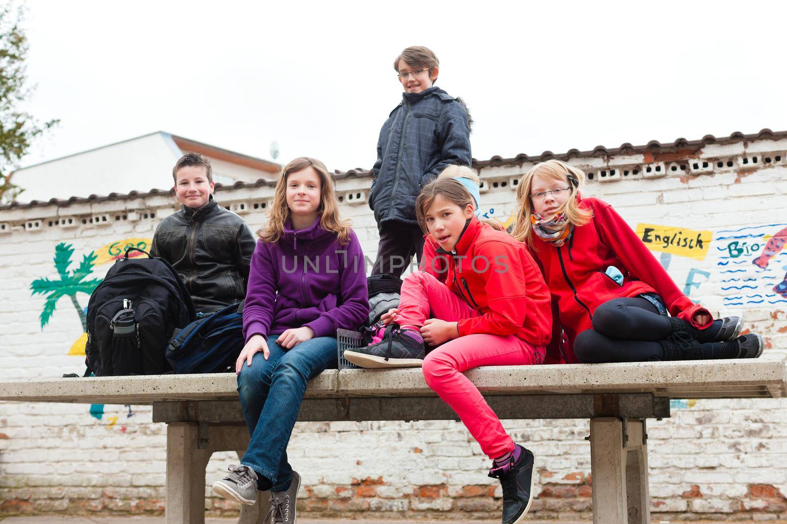 Education - Pupils at schoolyard of their school during recess