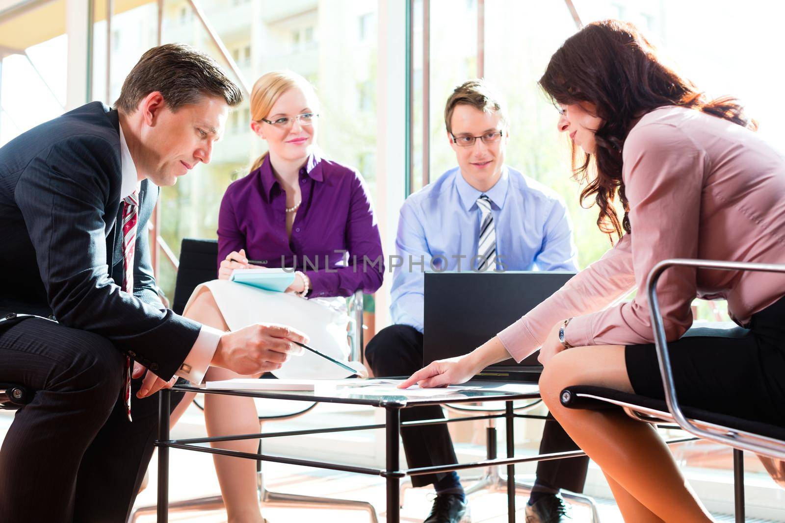 Business people having meeting or workshop in office