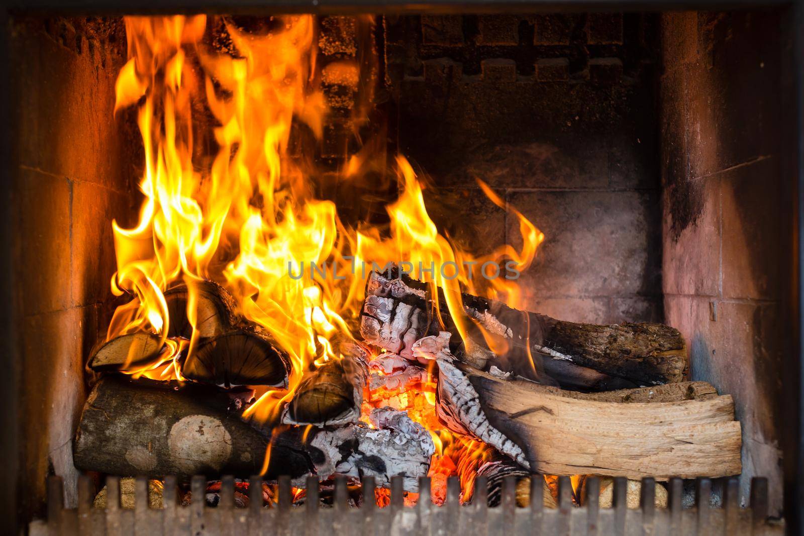 Fireplace or furnace invites you with its cozy blazing fire to warm up