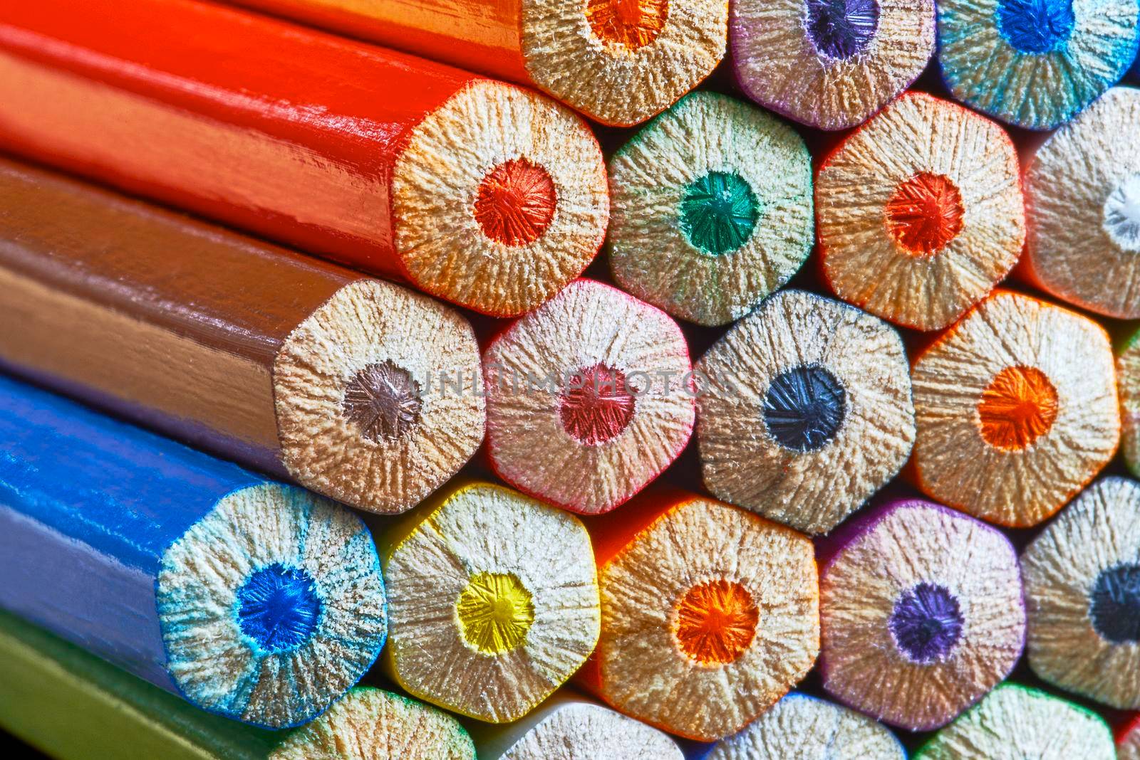 Macro differently colored end of colored crayons
