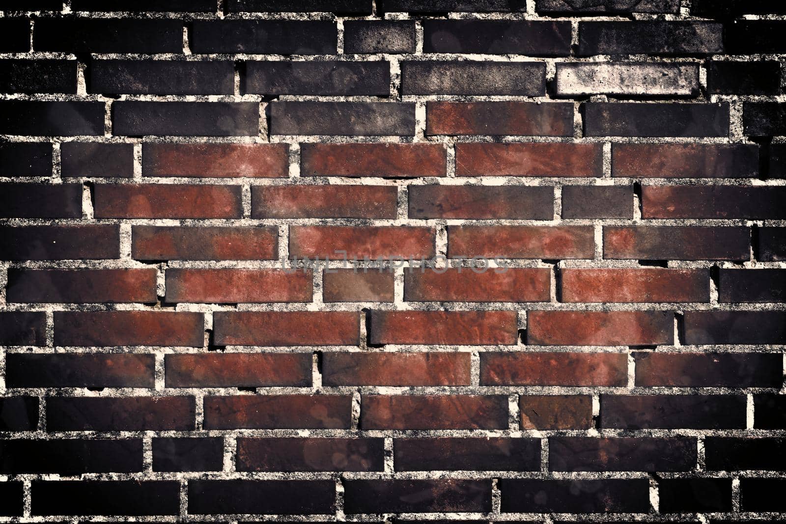 Aged and weathered old brick wall texture in a vintage retro design 