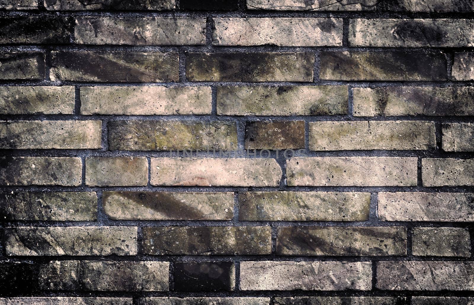 Aged and weathered old brick wall texture in a vintage retro design 