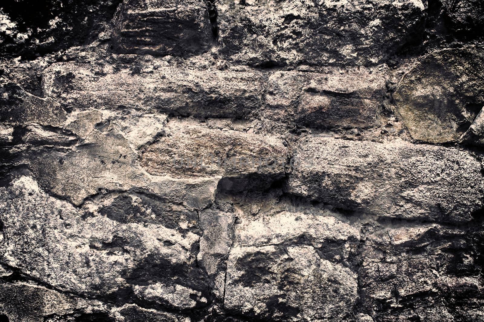 Aged and weathered old brick wall texture in a vintage retro design 