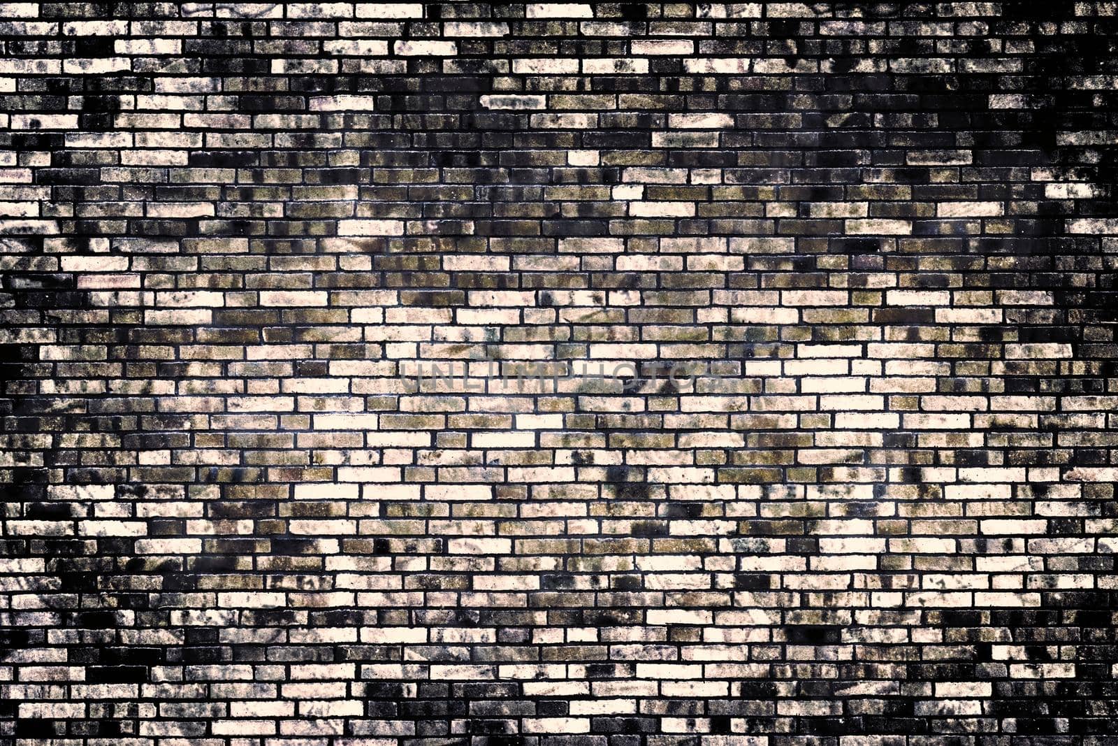 Aged and weathered old brick wall texture in a vintage retro design 