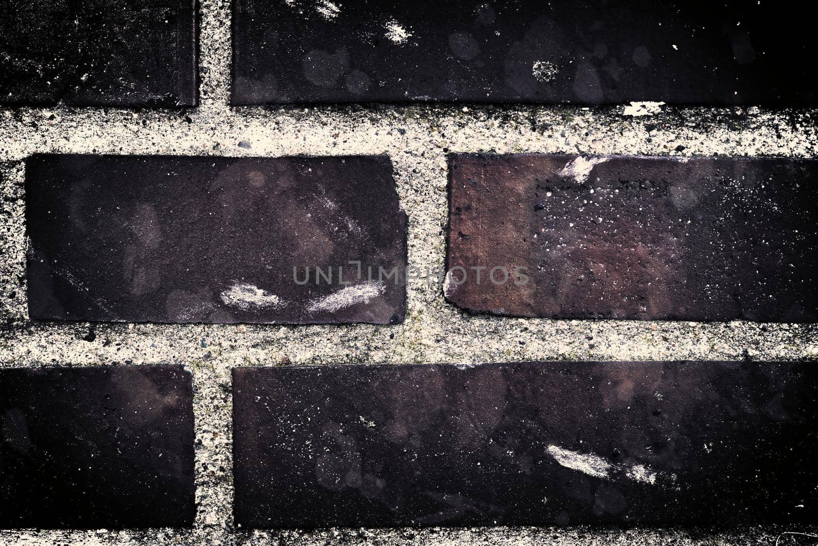 Aged and weathered old brick wall texture in a vintage retro design 