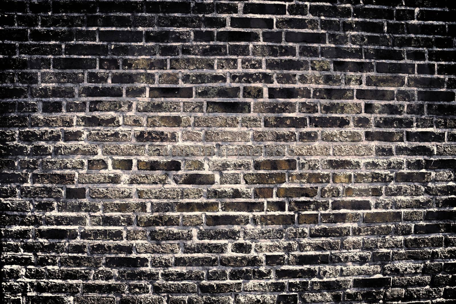 Aged and weathered old brick wall texture in a vintage retro design 